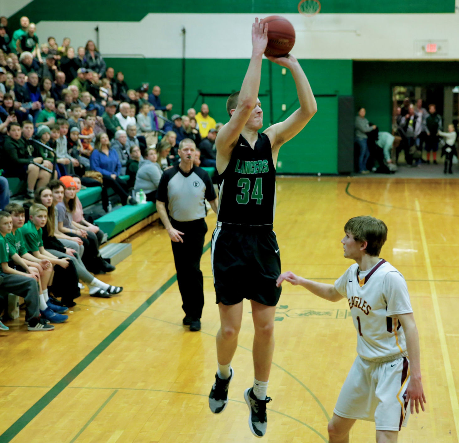 Section 1AA boys basketball...Dover-Eyota upsets LaCrescent-Hokah in overtime thriller